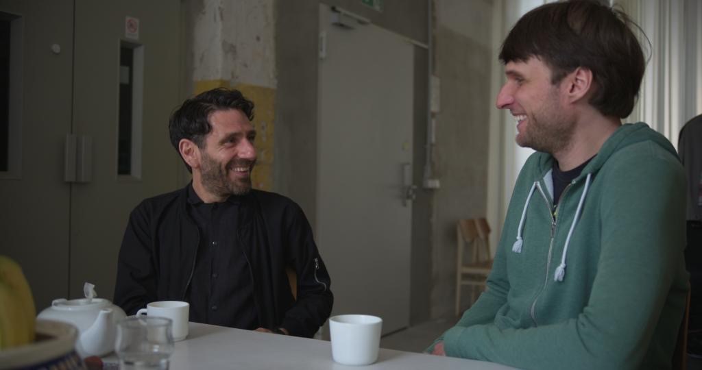 Artist Marco Barotti in discussion with BIFOLD Scientist Christopher Anders. Marco Barotti, Artist in Residence (l.) in discussion with BIFOLD researcher Christopher J. Anders